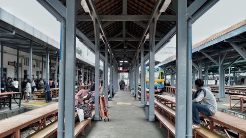 People at railroad station platform