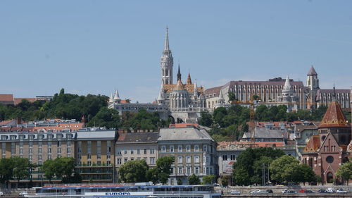 View of cityscape against clear sky