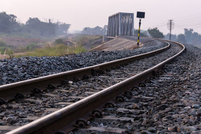 Railroad tracks against sky