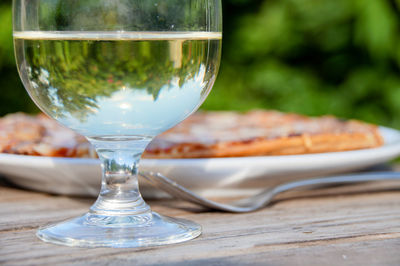 Close-up of wineglass on table