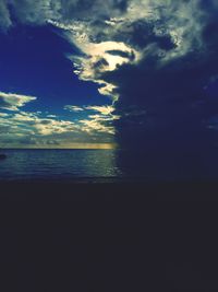 Scenic view of sea against sky at sunset