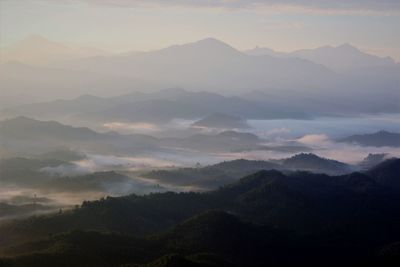 Scenic view of mountains against sky during sunset