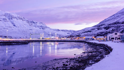 Scenic view of snowcapped mountains against sky during winter