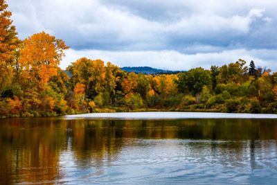 Scenic view of lake against sky during autumn