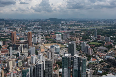 High angle view of cityscape seen from menara kuala lumpur tower