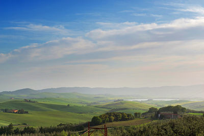 Beautiful spring evening froggy landscape in tuscany countryside, italy