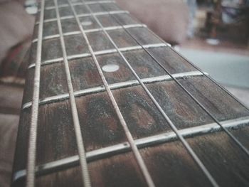 Close-up of playing guitar