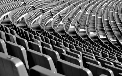 Full frame shot of empty chairs at stadium