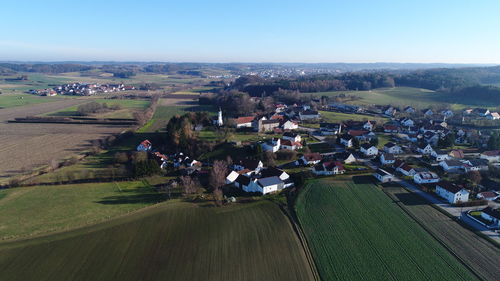 High angle view of agricultural field against clear sky