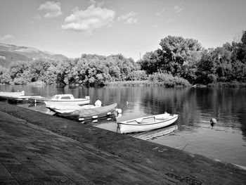 Scenic view of boats in lake