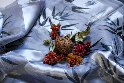 I love the art of photography and this is dried flowers with bamboo pattern scarf.