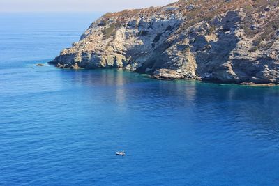 Scenic view of sea against blue sky