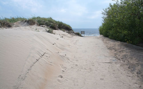 Scenic view of beach against sky