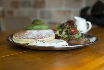 Close-up of food in plate on table