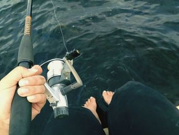 Cropped image of person in water