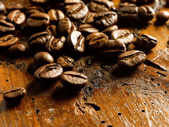 Close-up of coffee beans on table