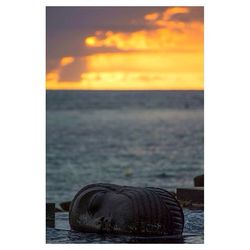 Scenic view of sea at sunset