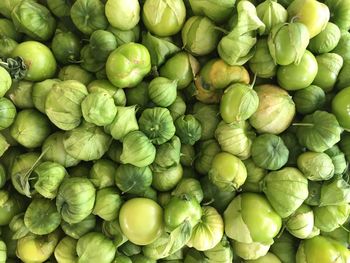 Full frame shot of tomatillos in market for sale