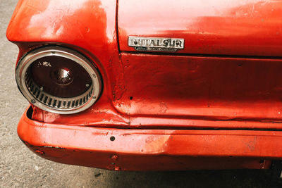 Close-up of red vintage car