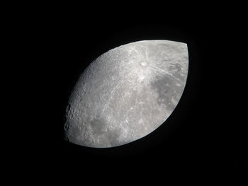 Low angle view of moon against sky at night