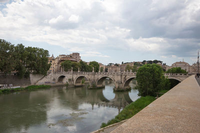 Panoramic of st. angelo bridge on cloudy day in summer 2021 italy.with cloudy day.