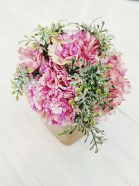 Close-up of pink flowers on table