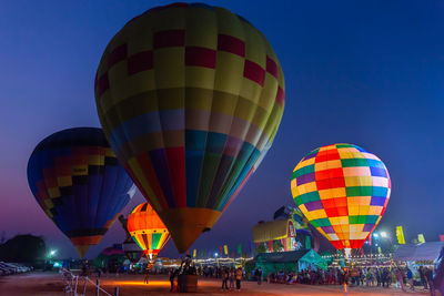 Multi colored hot air balloon against blue sky