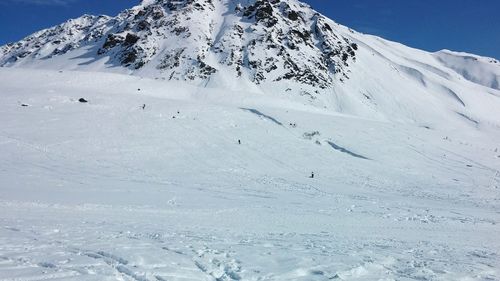 Snow covered mountain against sky