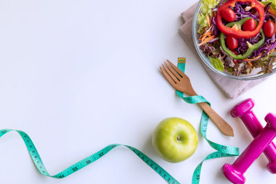 High angle view of fruits in plate on table