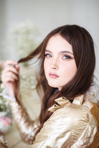 Close-up portrait of a young woman in a retro dress