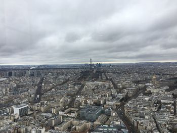 High angle view of city against cloudy sky