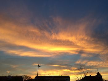 Low angle view of dramatic sky at sunset