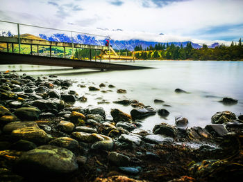 Scenic view of river against sky