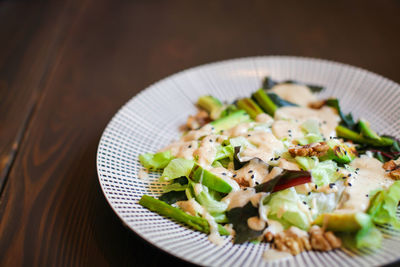 High angle view of salad in plate on table