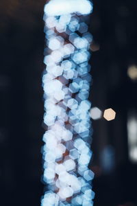 Defocused image of illuminated lights at night