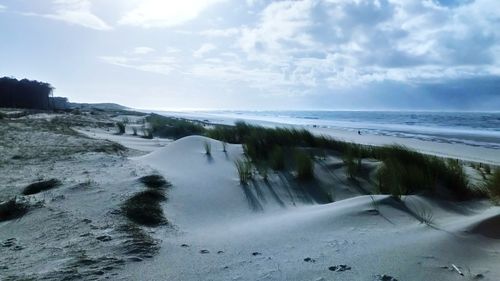 Scenic view of beach against sky