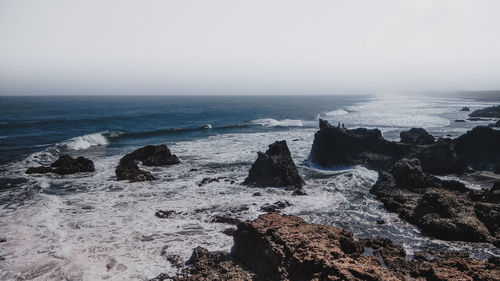 Scenic view of sea against clear sky