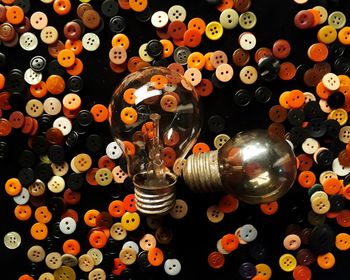 High angle view of various buttons on table