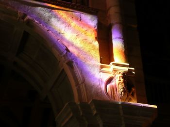 Low angle view of illuminated lamp