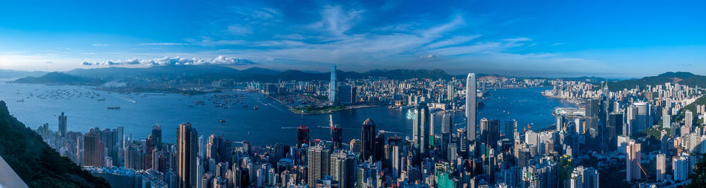 Panoramic view of city buildings against sky