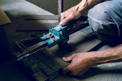 High angle view of man working on table