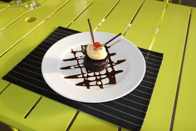 Close-up of cake served on table