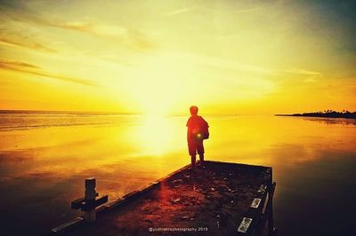 Scenic view of sea at sunset