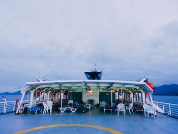 Ferry on sea against sky