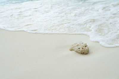 High angle view of sand on beach