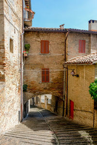 Alley amidst buildings in town