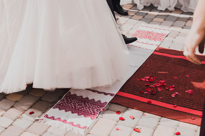 Low section of bride standing on floor