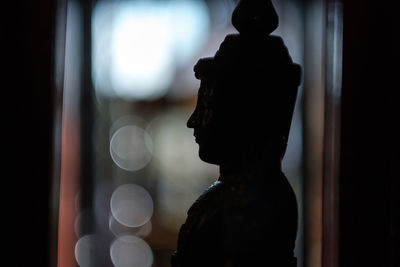 Silhouette buddha statue