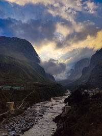 Scenic view of mountains against sky during sunset