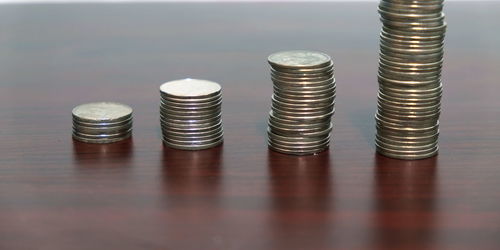 Close-up of coins on table